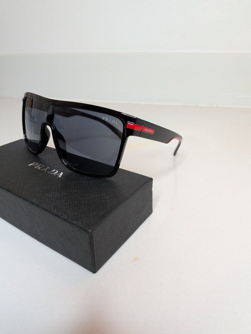 Prada Black Shield Sunglasses Red Logo